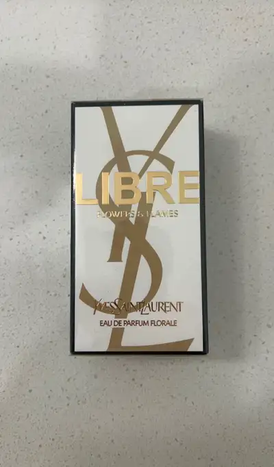 Yves Saint Laurent perfume flowers and flame, View more