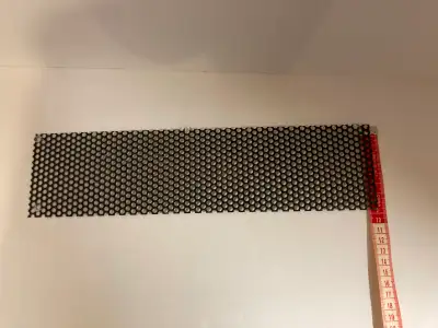 Arcade machine speaker grill Approx 9cm X 35cm Pick up in Orleans Email for more info.