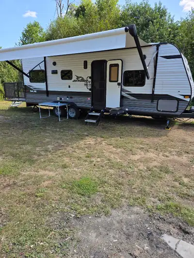Toyhauler setup for remote and park camping. 2 roof mounted solar panels and 2 deep cycle batteries...