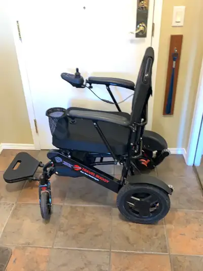 Travel Buggy electric wheelchair used for 3/4 year. It is perfect for an individual with decreased m...
