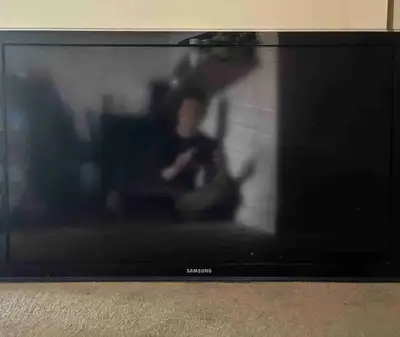 43 inch Samsung TV with wall mount attachments, View more