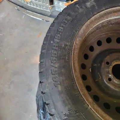 Four winter tires with rims. $100