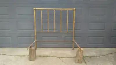 Antique double brass bed head board for sale. Will fit a 54" wide box spring (or slightly wider one)...