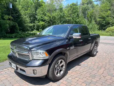 This 2018 RAM 1500 Laramie is powered by a reliable 5.7L HEMI engine, offering the robust performanc...