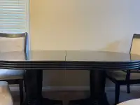 Dining table with 6 chairs and an extension