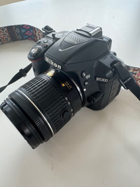 Nikon D5300 with lense, strap and charger 