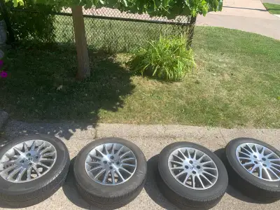 selling these acura oem rims and tires , came of a 2005 acura el , tires might have another summer s...