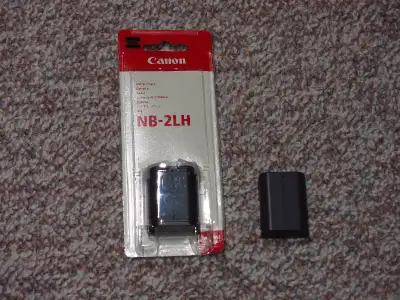Two Canon NB-2LH Battery Packs, View more