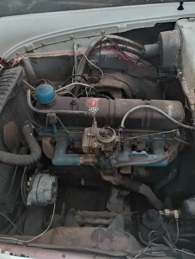 1958 ford 2 door ranch wagon all areginal. 6 cylinder a 223. 3 speed Standord on the steering column...