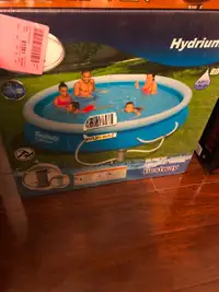 Brand New Hydrium Bckayard Pool with pump. 12 ft by 20 inches.
