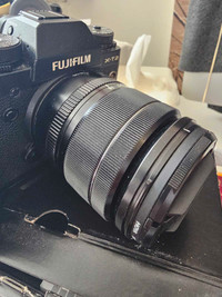 Fuji xf 18-55mm 2.8-4 R LM OIS lens filter box accessories. 