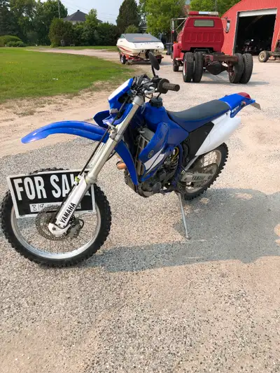 2003 WR 450, new carb, aftermarket tank. Good shape and runs strong, please call the number listed a...