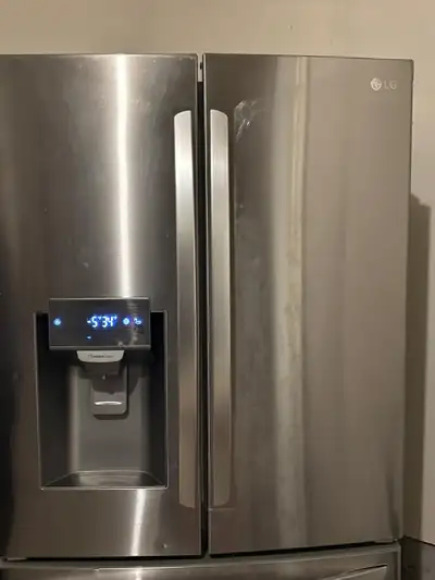 Bought brand new LG fridge LRFS28XBS - Print Proof Stalniess Steel 35.75° W × 69.75" H x 36.25* D Wa...