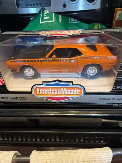 Beautiful orange car with black hood. Collector’s edition. Box is in great condition. Never taken ou...
