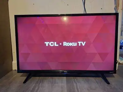 TCL 32" FHD Roku Smart TV .works great ! Remote.legs include, View more