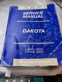 2002  DAKOTA FACTORY SERVICE MANUAL IS IN GOOD CONDITION W1365