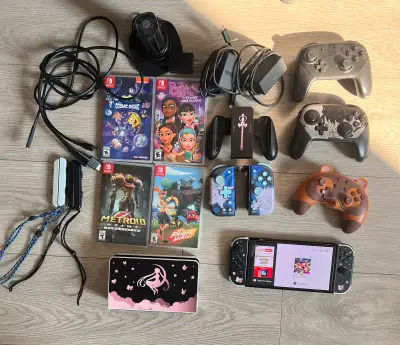Nintendo switch OLED bundle w/games, pro controller, View more