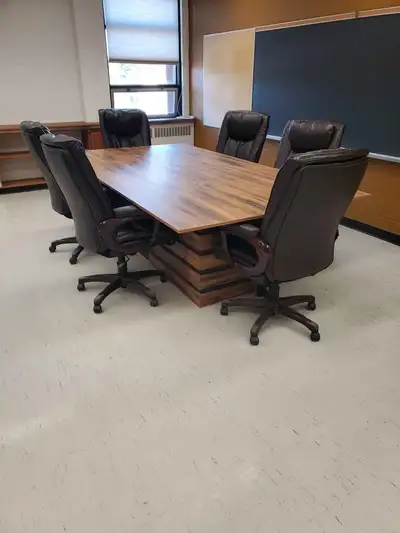 Beautiful custom table. Can be used as a boardroom table or in your home. It was purchased as a set...
