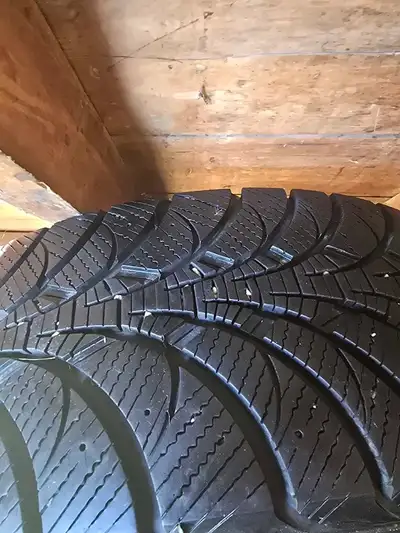 Selling set of 4 winter tires 235 65 R17 mounted on steel rims, used one season and kept in storage,...