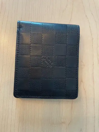Sleek Black Checkered Wallet – Excellent Condition, View more