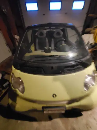 Find a little car the convertible needs a little work to close properly. Ask for details