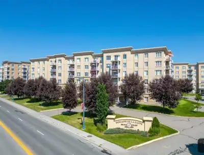 Superbe condo à distance de marche de tout+ sécurisé