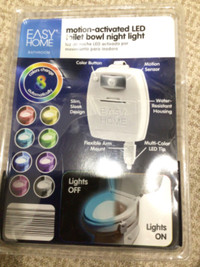 Motion-activated LED toilet bowl night light