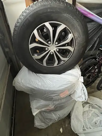 Selling a full set of 4 Michelin X-Ice winter tires mounted on 17-inch steel rims. • Tire size: 265/...