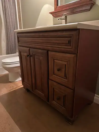 Dimensions: 36" wide by 35" tall without countertop. The countertop and sink are still good too and...