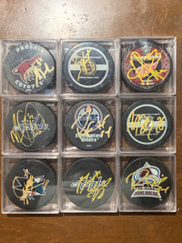 Hockey Pucks signed 