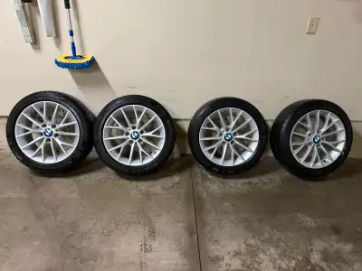 Set of genuine BMW OEM winter wheel package. Rims have no scrapes or scratches. Never been repaired...