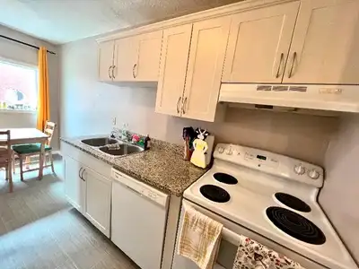 Bright 2-Bedroom Apt. * Main Floor * A/C * Available Immediately