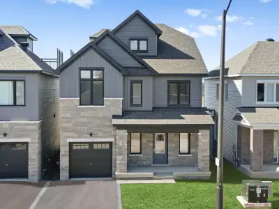 Brand new house for sale in the heart of Barrhaven 5 bedrooms 3.5 bathrooms Huge Loft Patio 9 feet c...