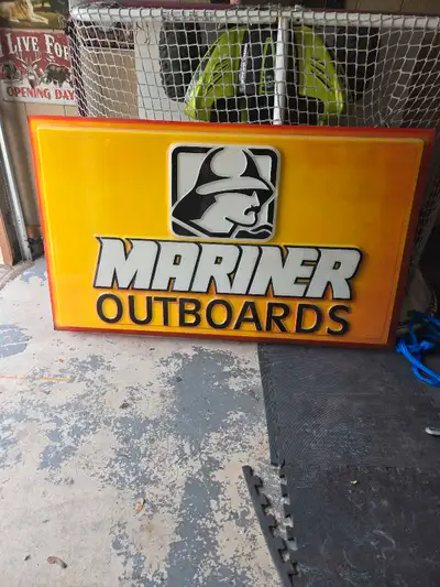 Mariner outboard sign... made out of rugged plastic. This sign is from the 80's... great for a colle...