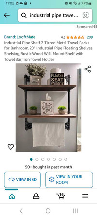 Bathroom shelf with towel holder