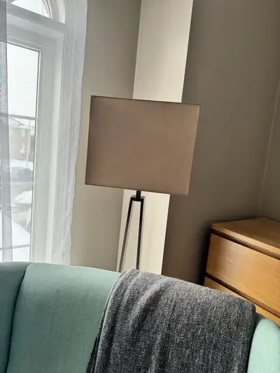 One floor ikea KLABB lamp with dark grey metallic base and dark beige shade and one desk KLABB lamp...