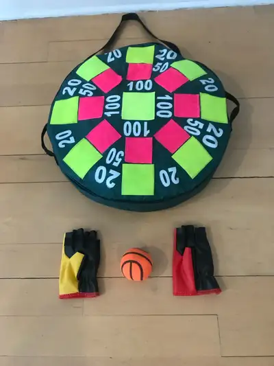 Velcro target and chess. Very good condition. Includes ball, chess pieces and 2 left-handed catching...