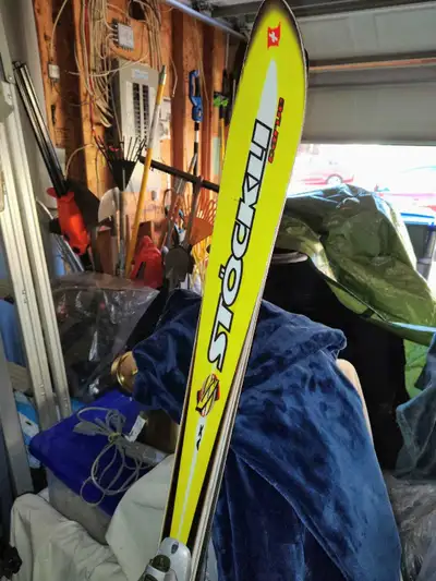 2 Pairs of Stockli Carve Laser downhill skis with Salomon bindings. Roughly 170cm length. Both pairs...