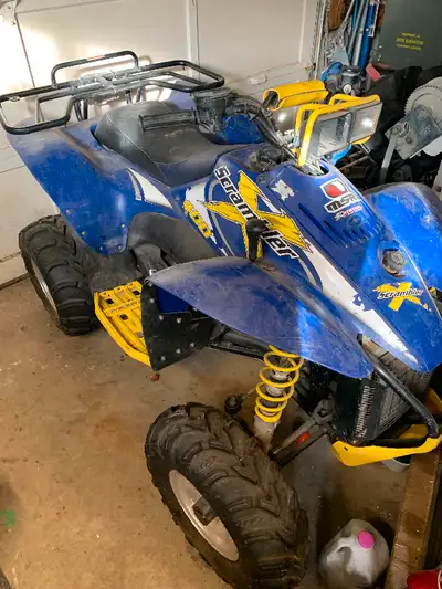 Polaris scrambler 400 cc, 2 stroke liquid cooled . Automatic drive. Stock engine still runs and work...