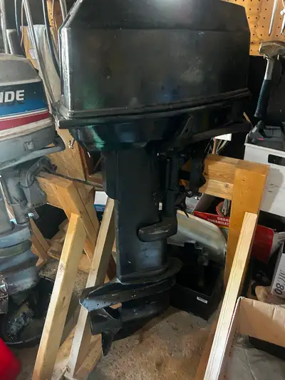 20 hp evinrude early 80s. Ran 2 yrs ago after replacing water pump. Needs some work.