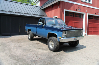 Square body Chevrolet pickup, 305ci V8, and four-speed automatic transmission with dual-range transf...