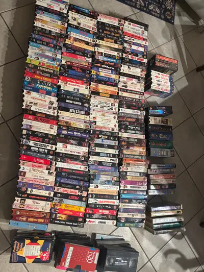 250 VHS tapes with 20"tv with built in VCR, View more