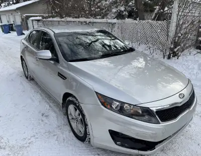 2011 Kia Optima 4 door sedan Grey/silver color In great condition Low mileage