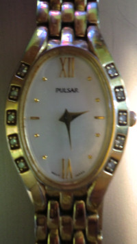 Pulsar Watch Stainless Steel (Gold Tone) with 10 Diamond Chips.