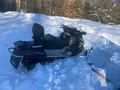 Selling my used Arctic Cat snowmobile, a reliable machine ready for winter adventures. It's in good...