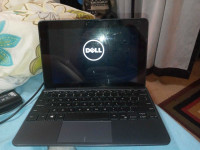 Dell tablet mini laptop with charger sell or trade for cellphine