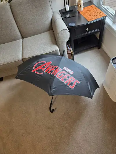 Stay dry in superhero style with this Marvel Avengers umbrella! This umbrella is new and not used co...