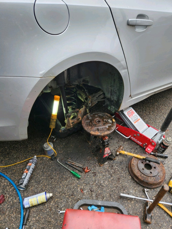 Auto mechanic offering affordable repairs and seasonal tire chan