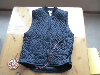Motorcycle Electric vest 12 volt size 38. Used but like new. Made in British Columbia by BlackJack E...