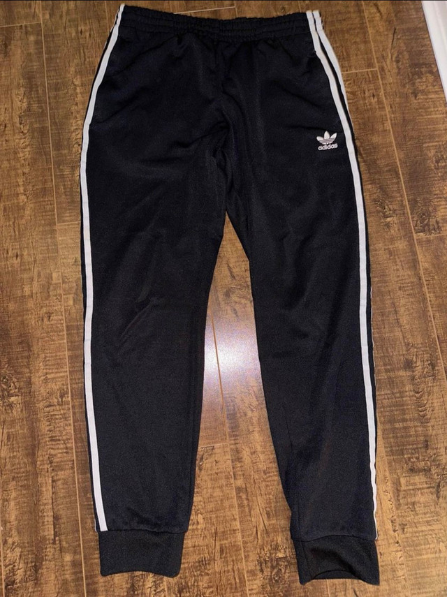 Women’s Adidas track pants size large  in Women's - Bottoms in Hamilton